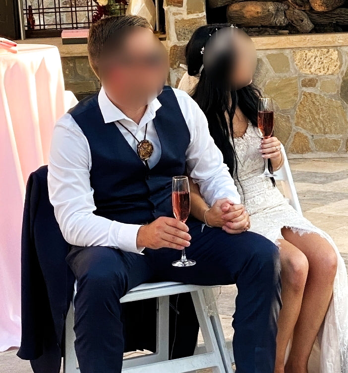 Beautiful wedding couple wearing bolo tie