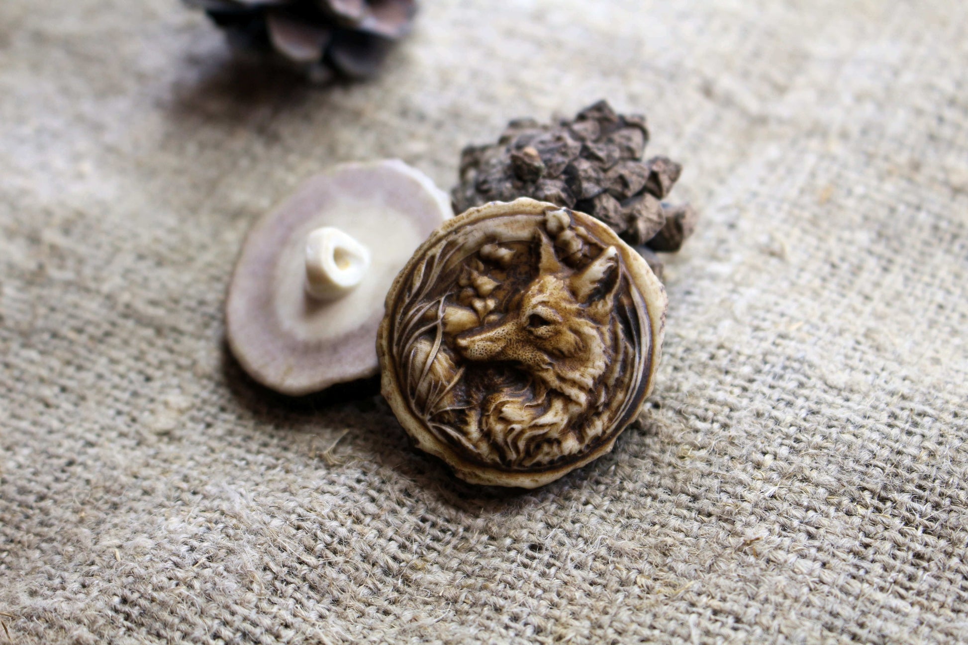 Deer antler sewing buttons featuring a special engraved pattern