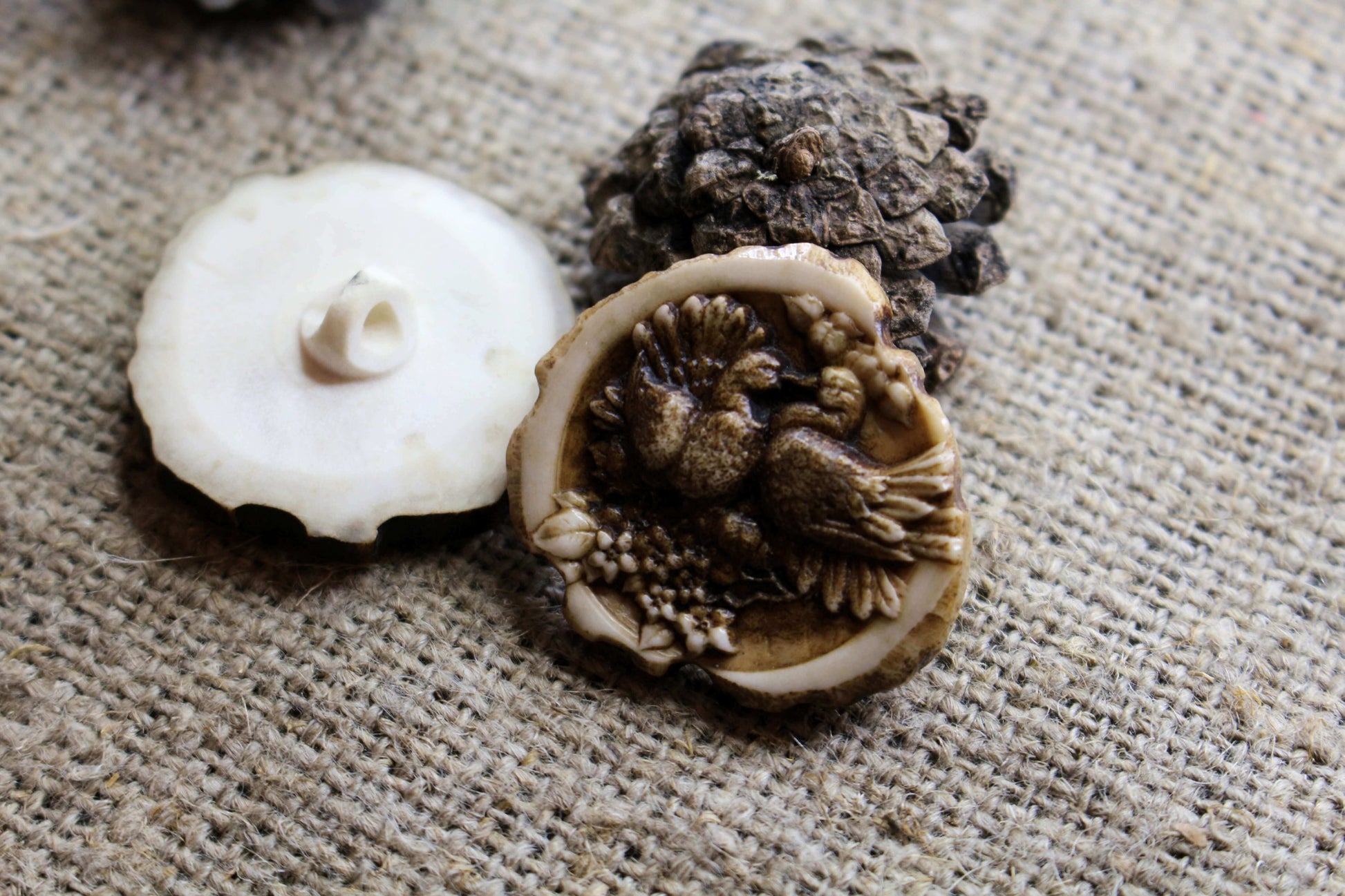 Natural antler sewing buttons with custom engraved pattern