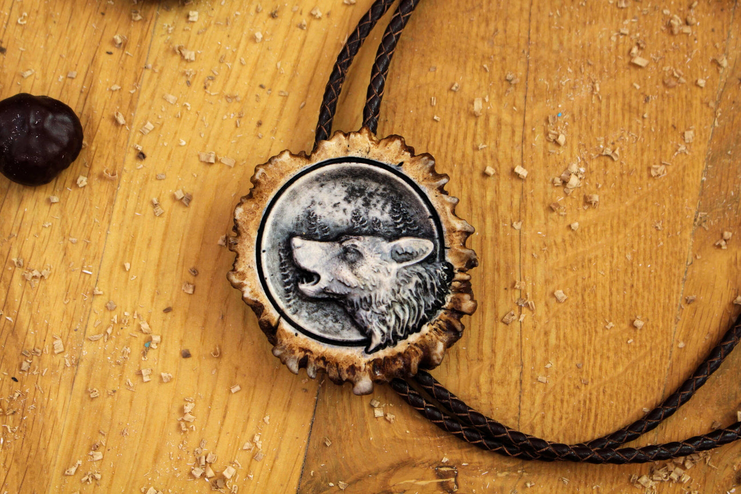 Bolo Tie made from Deer Antler with leather cord and Howling Wolf design