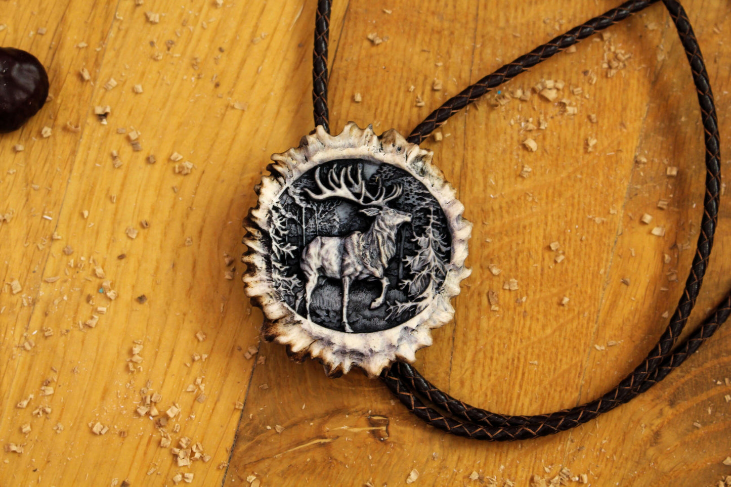 Handmade Bolo Tie from Deer Antler with zoomed in Elegant Deer design