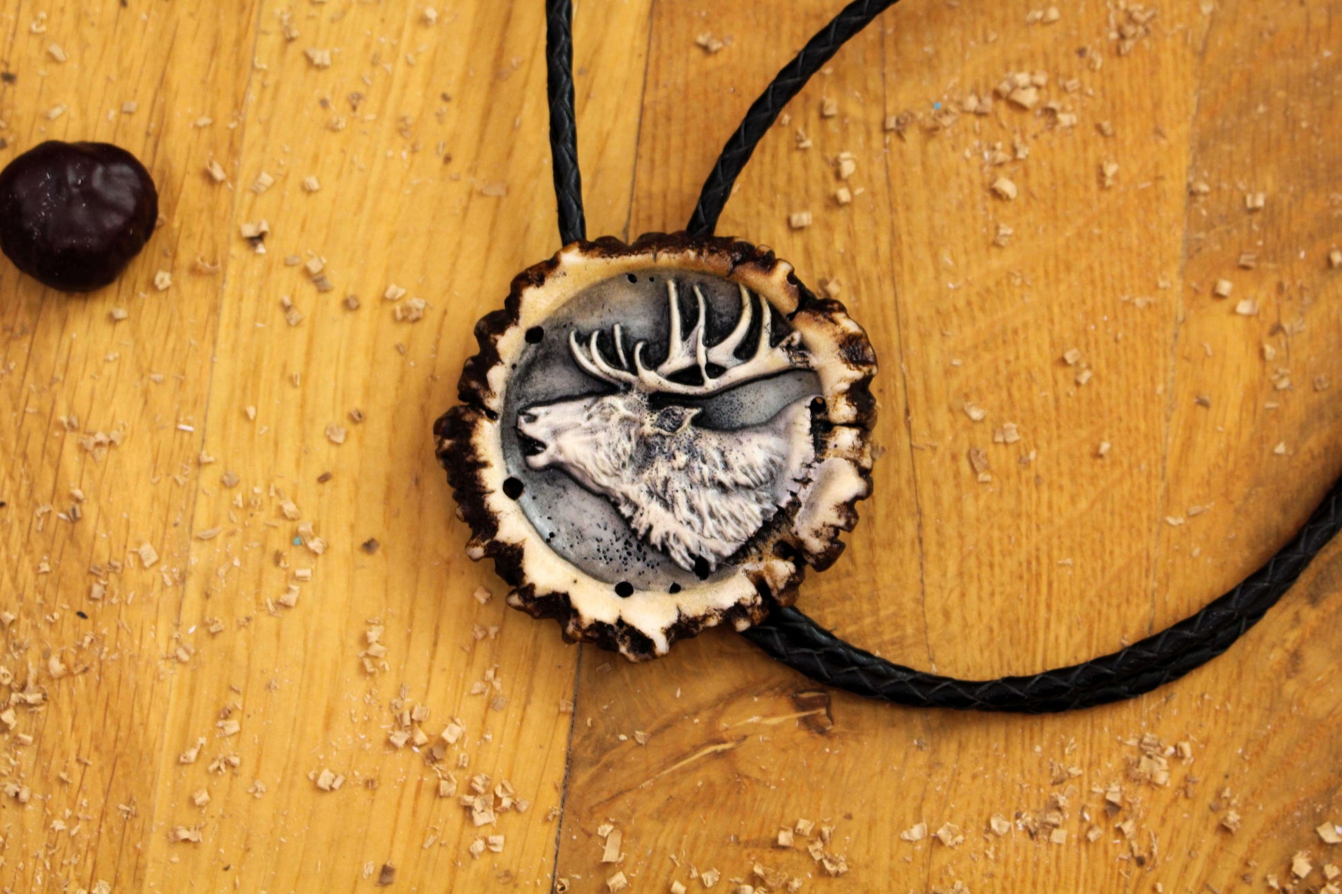 Deer Antler Bolo Tie, with zoomed in Deer Portrait design