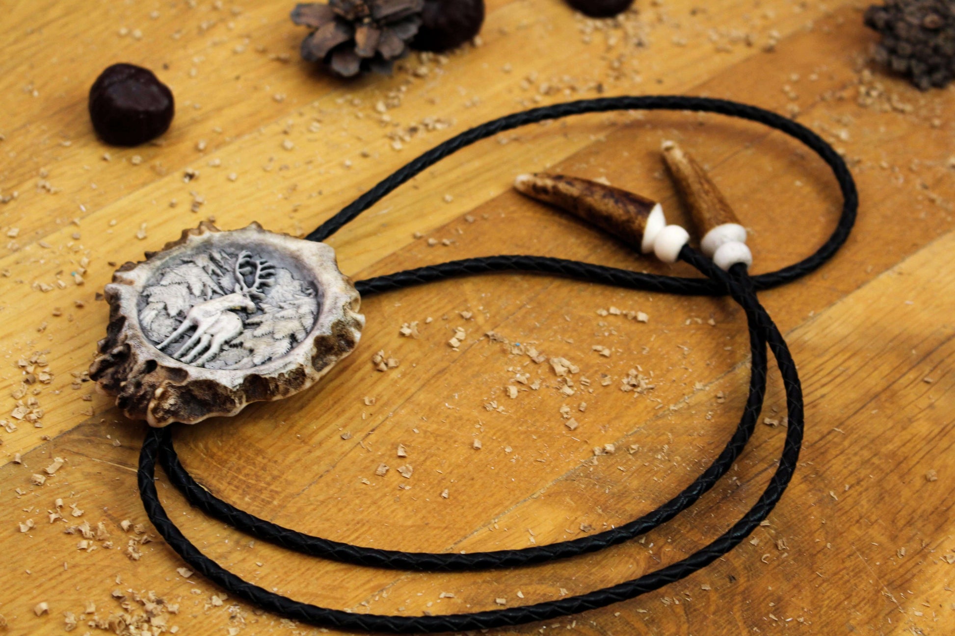 Bolo Tie crafted from Deer Antler and showcasing Standing Deer design
