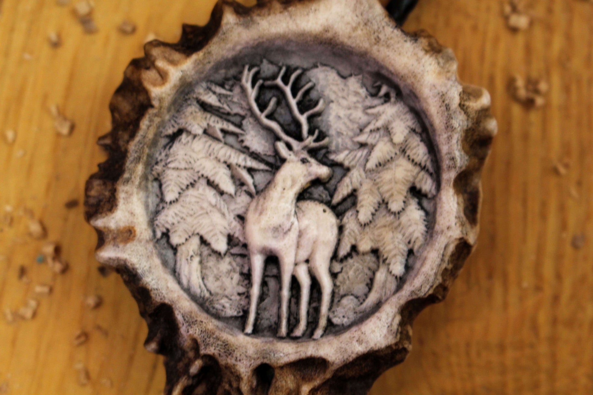 Bolo Tie close up shot of design featuring Deer Standing