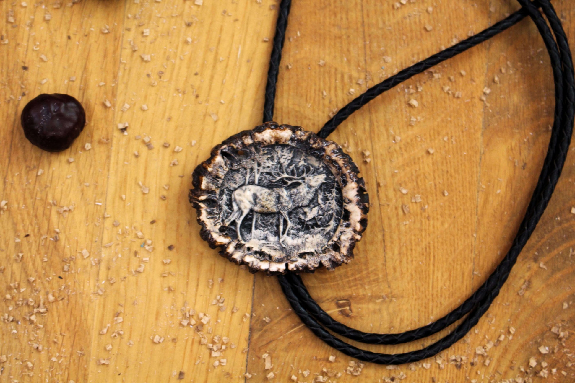 Deer Antler Bolo Tie, with zoomed in Deer Roaring design