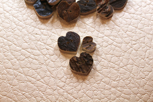 Deer antler buttons shaped like hearts