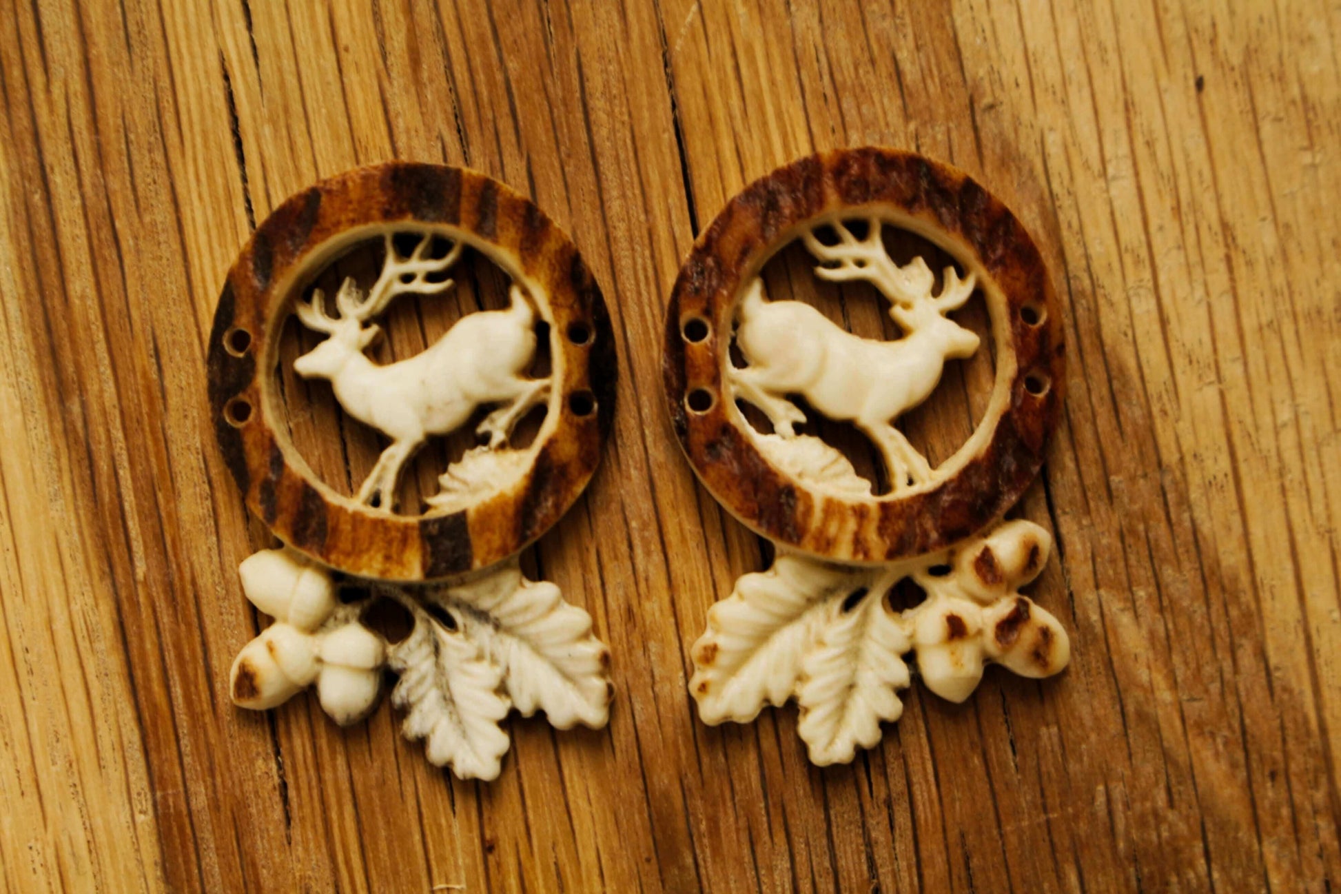 Crafted antler sewing buttons with distinctive engraved motif