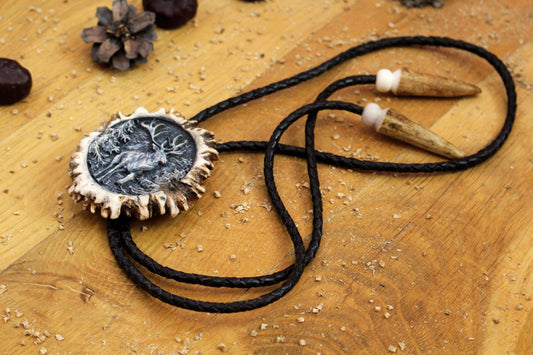 Bolo Tie skillfully handcrafted from Deer Antler, featuring an exquisite Running Deer image