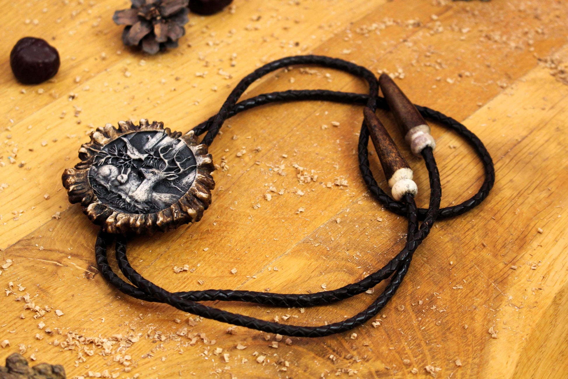 Bolo Tie fashioned from real Deer Antler and a distinctive Nature Eidyllion Design