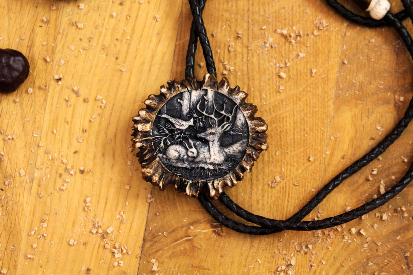 Handcrafted Bolo Tie with leather cord, Deer Antler tips and Nature Eidyllion Design